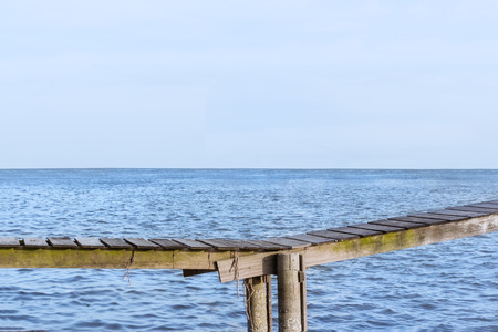 close up, wooden bridge with seaの写真素材