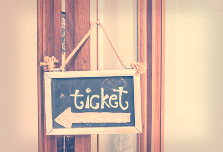 A sign that hung in front of the ticket gate, vintage filters.の写真素材