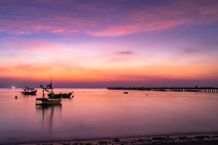 Long exposure, Beautiful sunset view with wooden jetty . Nature composition.の写真素材