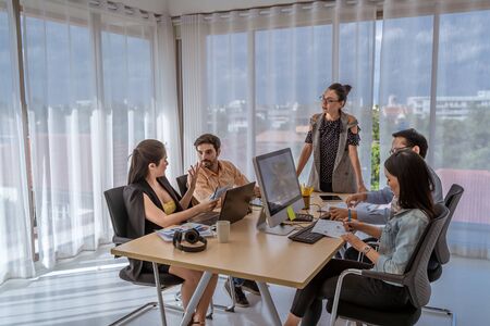 The meeting atmosphere of the business team with Women in business leadership, relaxed styleの写真素材