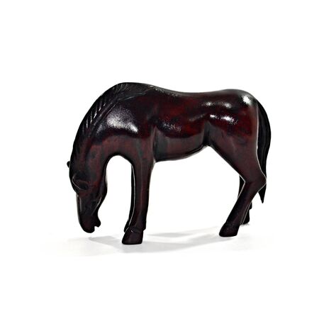 Ancient Sculpture of a wood horse on white backgroundの写真素材