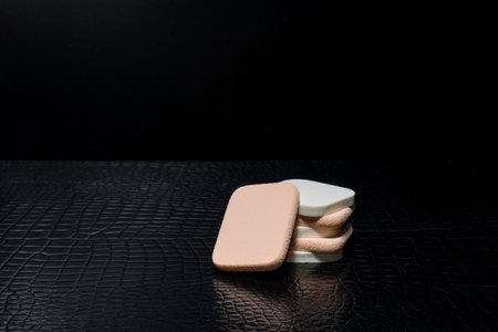Sponge for cleaning face isolated on Black