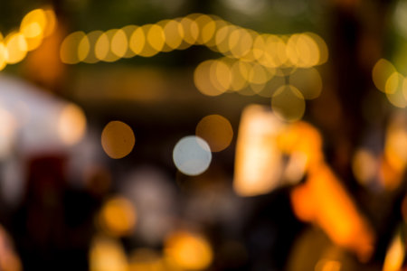 blur image of night festival on street blurred background with bokehの写真素材