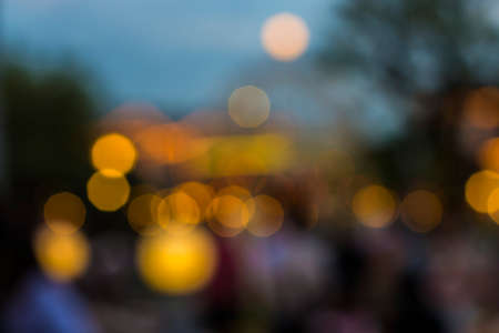 blur image of night festival on street blurred background with bokehの写真素材