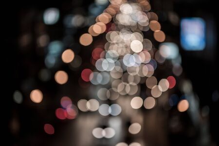 abstact blur bokeh of Evening traffic jam on road in city., night sceneの写真素材