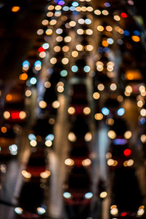 abstact blur bokeh of Evening traffic jam on road in city., night sceneの写真素材