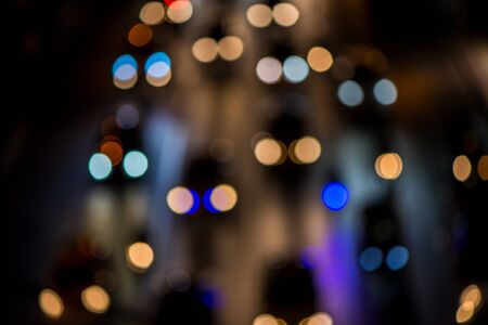 abstact blur bokeh of Evening traffic jam on road in city., night sceneの写真素材