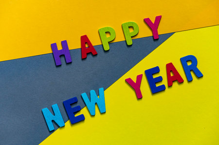 Happy new year font art colorful texting for greeting or celebrate card with colorful background, Sensitive Focusの写真素材