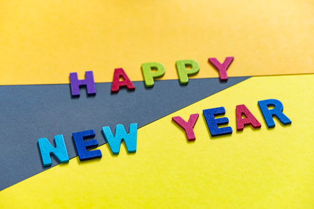 Happy new year font art colorful texting for greeting or celebrate card with colorful background, Sensitive Focusの写真素材