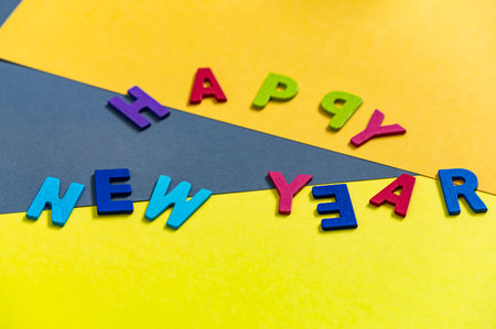 Happy new year font art colorful texting for greeting or celebrate card with colorful background, Sensitive Focusの写真素材