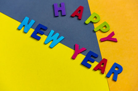 Happy new year font art colorful texting for greeting or celebrate card with colorful background, Sensitive Focusの写真素材