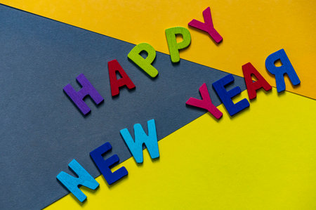 Happy new year font art colorful texting for greeting or celebrate card with colorful background, Sensitive Focusの写真素材