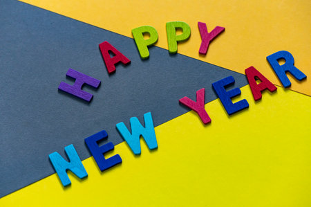 Happy new year font art colorful texting for greeting or celebrate card with colorful background, Sensitive Focusの写真素材