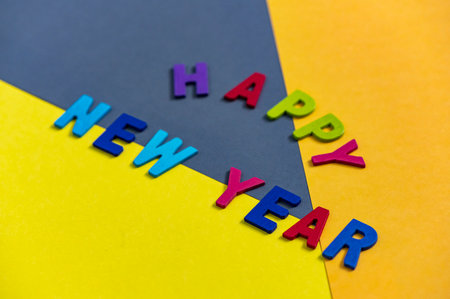 Happy new year font art colorful texting for greeting or celebrate card with colorful background, Sensitive Focusの写真素材