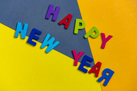 Happy new year font art colorful texting for greeting or celebrate card with colorful background, Sensitive Focusの写真素材
