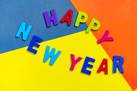 Happy new year font art colorful texting for greeting or celebrate card with colorful background, Sensitive Focusの写真素材
