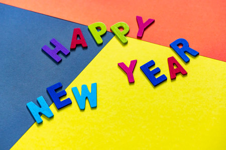 Happy new year font art colorful texting for greeting or celebrate card with colorful background, Sensitive Focusの写真素材