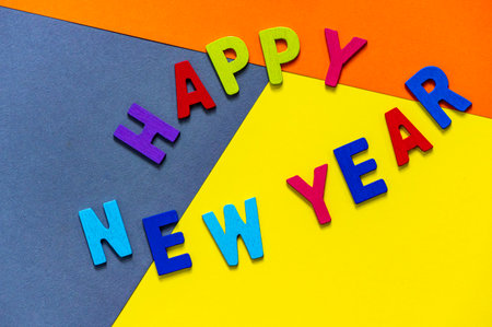 Happy new year font art colorful texting for greeting or celebrate card with colorful background, Sensitive Focusの写真素材