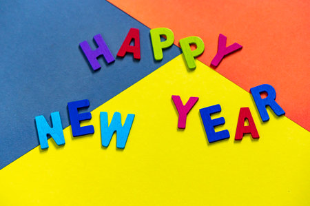 Happy new year font art colorful texting for greeting or celebrate card with colorful background, Sensitive Focusの写真素材
