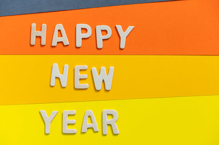 Happy new year font art colorful texting for greeting or celebrate card with colorful background, Sensitive Focusの写真素材
