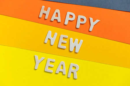 Happy new year font art colorful texting for greeting or celebrate card with colorful background, Sensitive Focusの写真素材