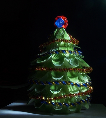 Homemade Christmas tree. The tree is made of plastic forks and spoons. Creativity. Subject shooting.の写真素材