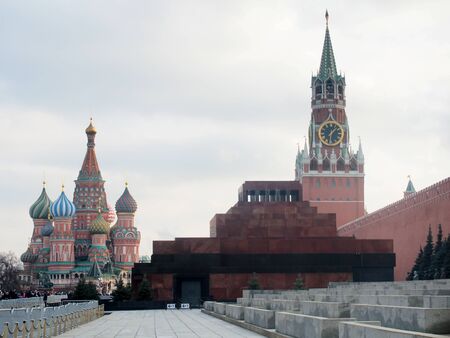 Red square in Moscow. Visible wall and towers of the Kremlin, Lenin Mausoleum and St. Basil's Cathedral. Sight.の写真素材