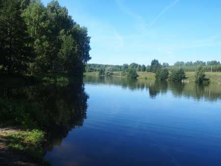 Summer landscape. View of the river, trees, river bank. Nature.の写真素材