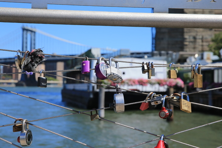 A view of love padlocks attached on the cables of Pier 1 in Brooklyn on August 23, 2016. (Gordon Donovan)のeditorial素材