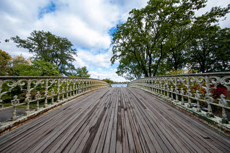 Colorful trees and the water near the Loch in Central Park, New York Cityの写真素材