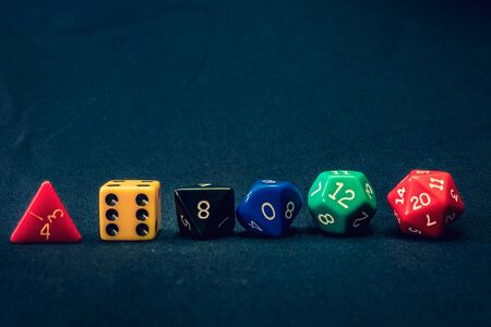 dice set of 6 line up on table with numbers facingの写真素材