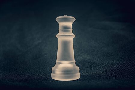 frosted white glass King chess piece on backgroundの写真素材
