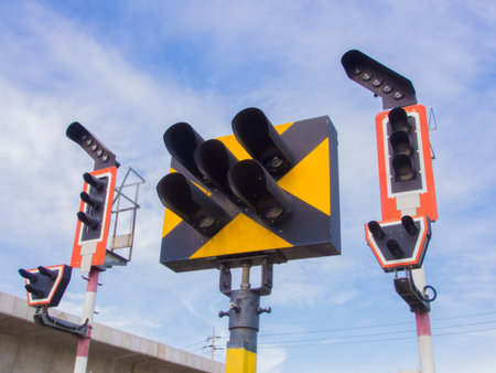 Train traffic light system with blue sky background