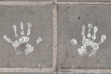 White painted hand printed on cement floor