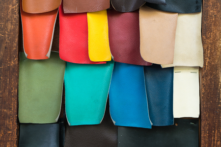 PU artificial leather swatch on wooden boardの写真素材