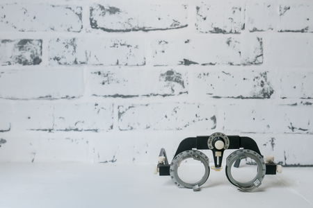 Manual eyes sight examination tools with a set of trial lenses for a phoropter used for eye examの写真素材