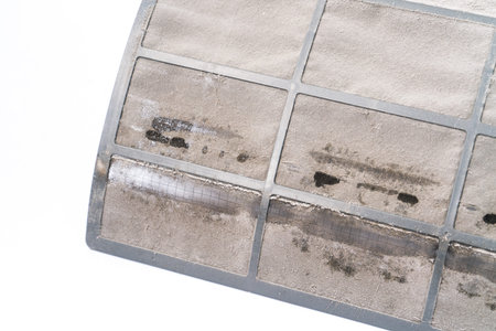 Dusty air conditioner filter. Looks harmful to people health if breath inの写真素材