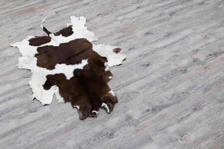 cow skin made into a carpetの写真素材