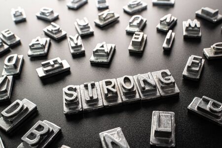 Metal letter formed into word strongの写真素材