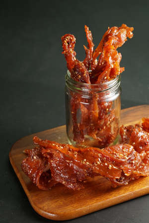 Thai pork jerky fired with sesameの写真素材