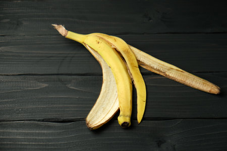 banana peel on a dark wooden backgroundの写真素材