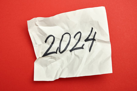 2024 inscription on a sheet of paper. A simple New Year's conceptの写真素材