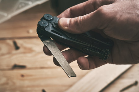 LVIV, UKRAINE - December 21, 2023:: Multitool Leatherman Wave Plus blackのeditorial素材