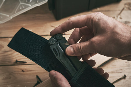LVIV, UKRAINE - December 21, 2023:: Multitool Leatherman Wave Plus black