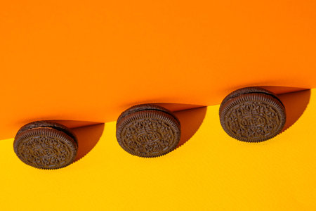 LVIV, UKRAINE - November 27, 2023: oreo cookies creative photo on color backgroundのeditorial素材