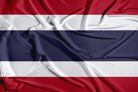 Thailand official national flag of silk fabric texture. Waving Fabric Flag of Thailandの写真素材