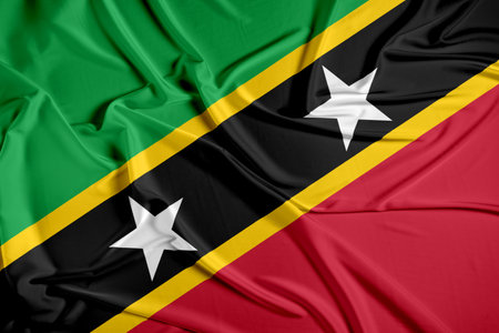 Saint Kitts and Nevisofficial national flag of silk fabric texture. Waving Fabric Flag of Saint Kitts and Nevisの写真素材