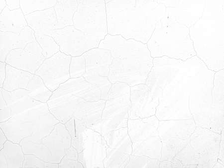 cracks on the wall. wall texture. old plaster. paint on the wall. cracks and scratchesの写真素材
