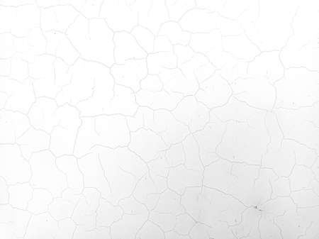cracks on the wall. wall texture. old plaster. paint on the wall. cracks and scratchesの写真素材