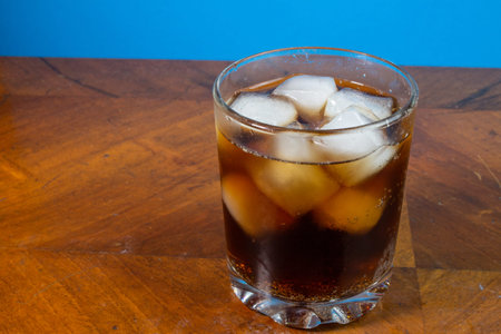 ice in a glass. ice cubes in a transparent glass.